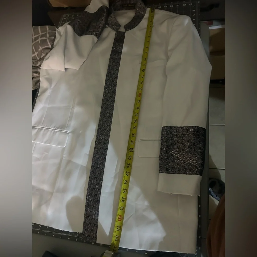 Sophisticated White Blazer with Black Patterned Accents